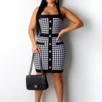 Checkmate, [insert unique name]! This sleeveless white and black checked design short gown is a fashion win! Shop now and make your style move.